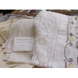2 embroidered and crotched table cloths
