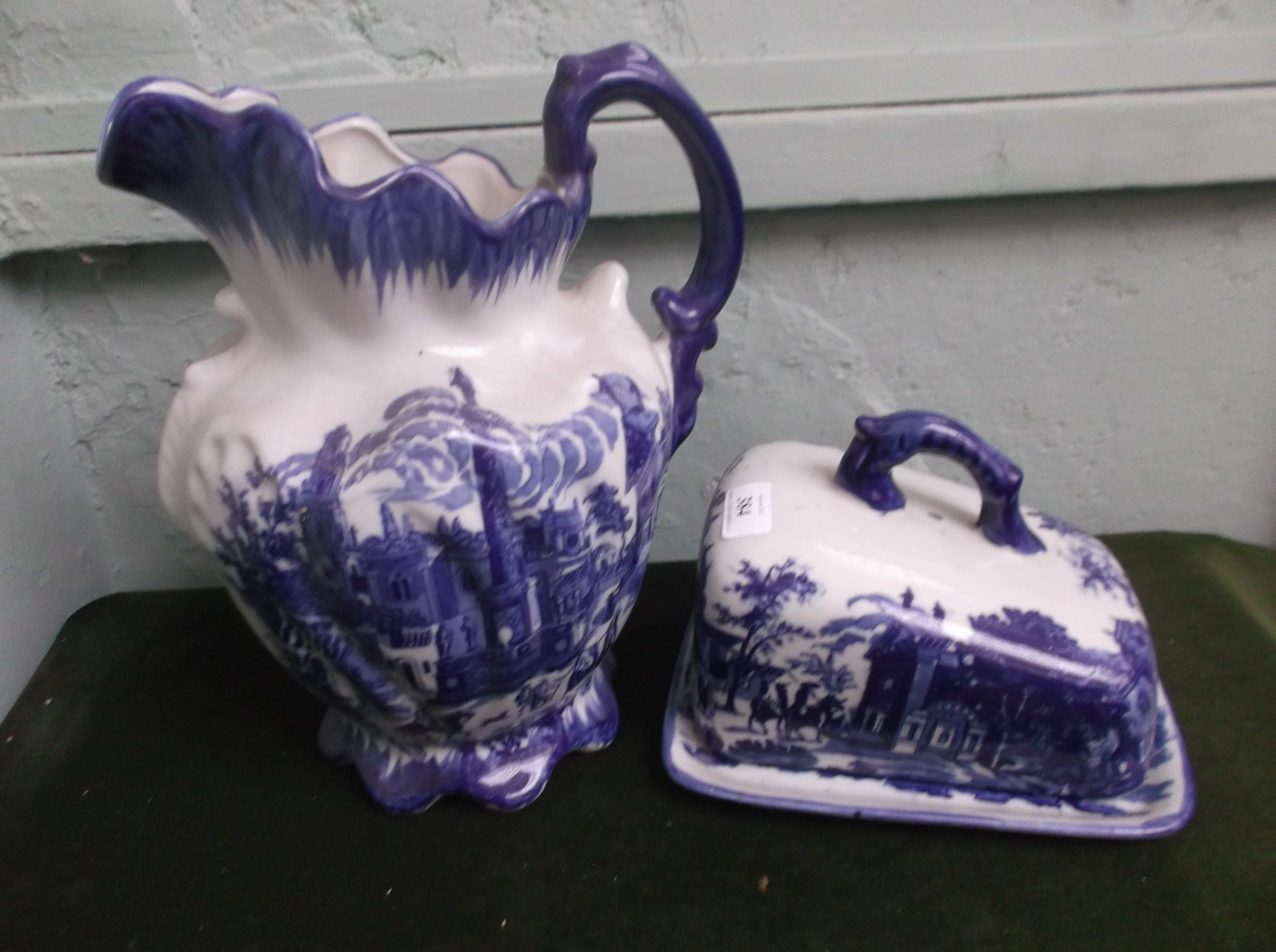 Vivid blue and white lidded cheese dish and toilet jug in similar style