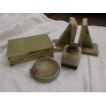4 pieces of green onyx ware incl. pair of bookends, cigarette box etc.