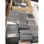 3 boxes of early slides on a variety of subjects