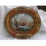 Coloured print of the Brayford and Lincoln Cathedral in decorative oval frame