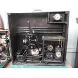 Very early baby projector with accessories in black wooden carrying case