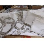 Ecru embroidered cloths and table mats