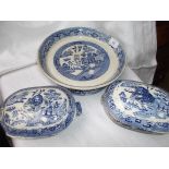 Circular willow patterned stilton cheese dish and 2 lidded sauce boats
