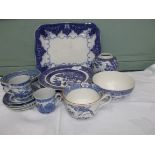 Tray of blue and white principally willow patterned ware