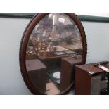 Beaded oak framed bevel edged oval wall mirror