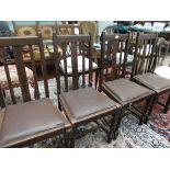 4 oak high backed dining chairs each with twist stemmed supports,