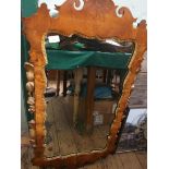 Ornately carved walnut framed rectangular wall mirror