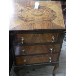 Neat early 20th century ladies fall leaf bureau in mixed woods,