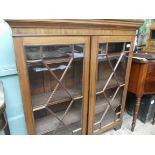 Mahogany display cabinet with 2 principally glazed astragal doors (1 damaged) and 3 display shelves