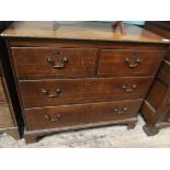 Oak period chest of 2 short and 2 long drawers all with brass drop handles on bracket feet (36" x