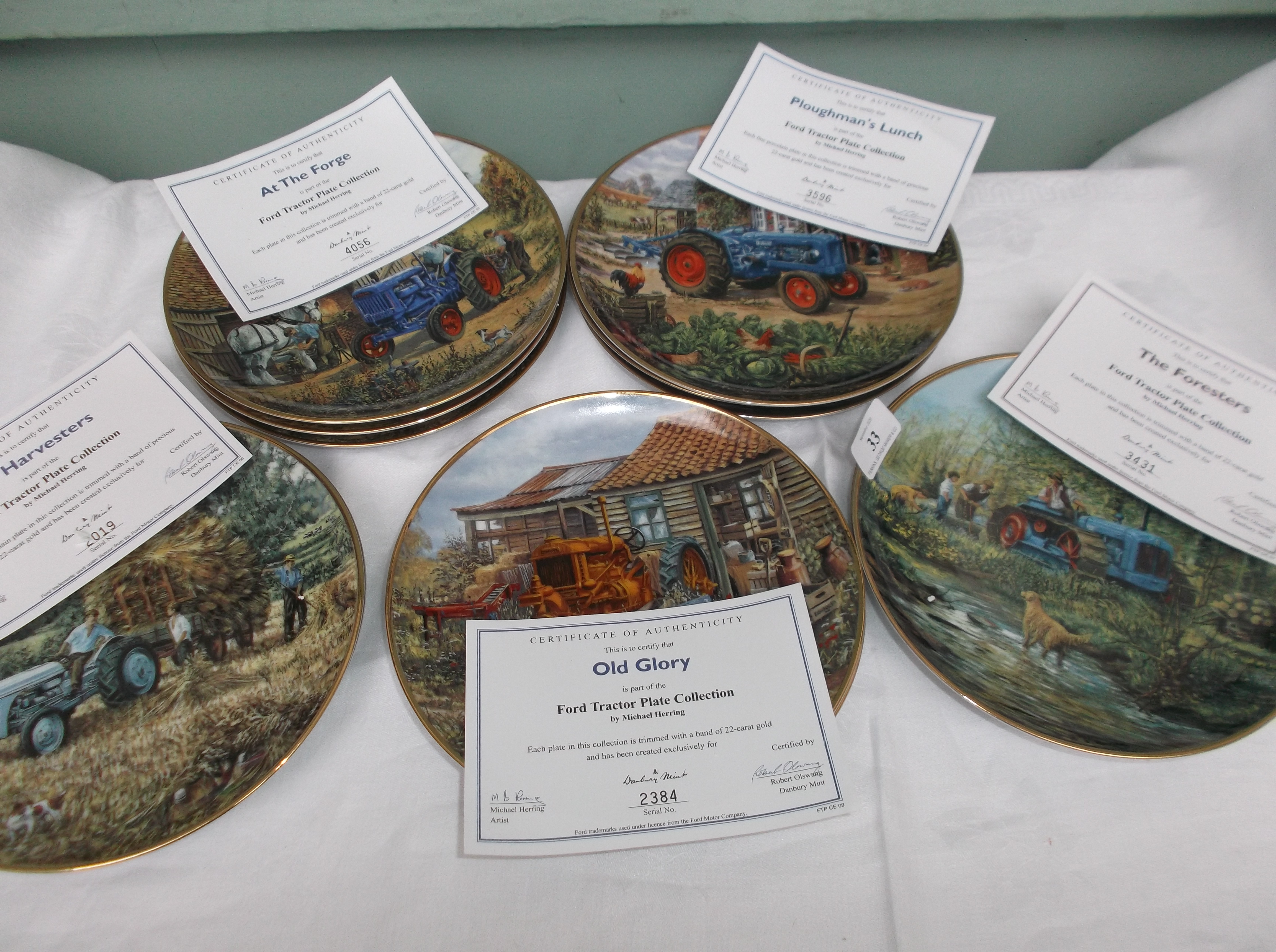 Pristine collection of 12 Ford Tractor plates by Michael Herring each with certificate of