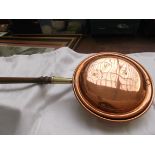 Copper warming pan with long turned handle