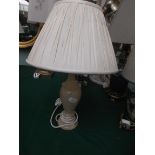 White onyx table lamp with cream silk shade