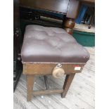 Oak framed adjustable piano stool with buttoned brown leather seat