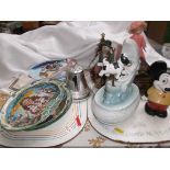 2 trays of curios incl. miniature musical plates, man in the moon cow ornament etc.