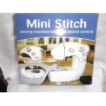 Boxed mini stitch sewing machine with 2 speed control