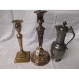 Sheffield plated candlestick on heavy circular base,