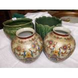 2 dark green bulb holders and a pair of satsuma style multi-coloured flower vases