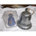 Heavy metal ships bell and a blue Danish porcelain presentation bell in presentation box