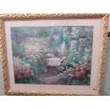 Large cream and gilt framed signed coloured print of patio garden scene