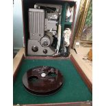Specto '500' projector in brown leather carrying case