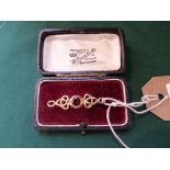9ct gold and garnet Celtic style brooch in original case