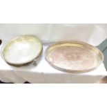 Oval plated serving tray with pierced raised gallery and a circular plated and glass fruit bowl