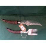Ornate pair of engraved bone handled fish servers,