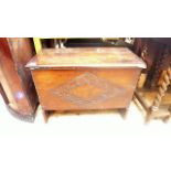 Antique oak storage chest with diamond shaped carving to front (28" wide)