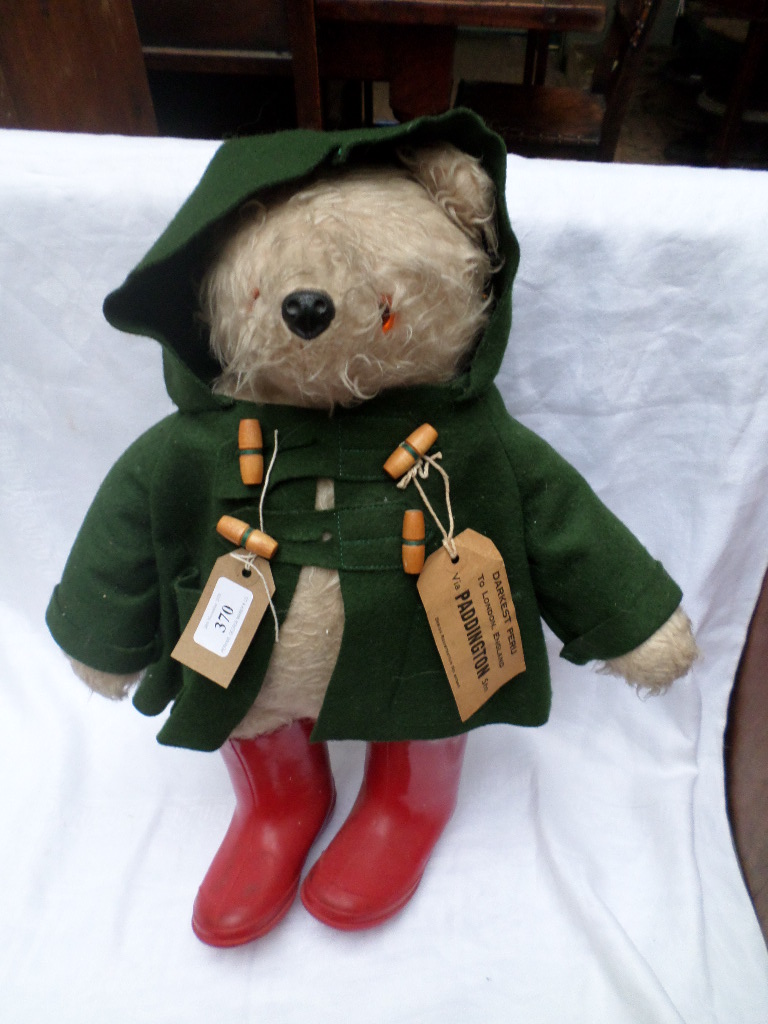 Paddington Bear with felt green overjacket, and red wellies,