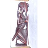 Tribal Art figure of a carving of a Warrior with lance and sheath knife
