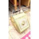 Handled brass coal scuttle the interior fitted tin liner