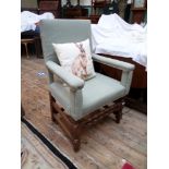 Oak framed armchair, the padded backs,