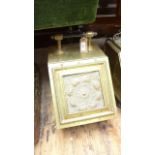 Handled brass coal scuttle the interior fitted tin liner