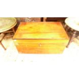 A brass bound rectangular storage box in mixed woods,