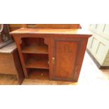 Unusual decorative wall cupboard with 3 open display shelves and a shelved cupboard beside