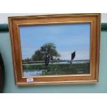 Framed oil on board of riverside scene signed A.