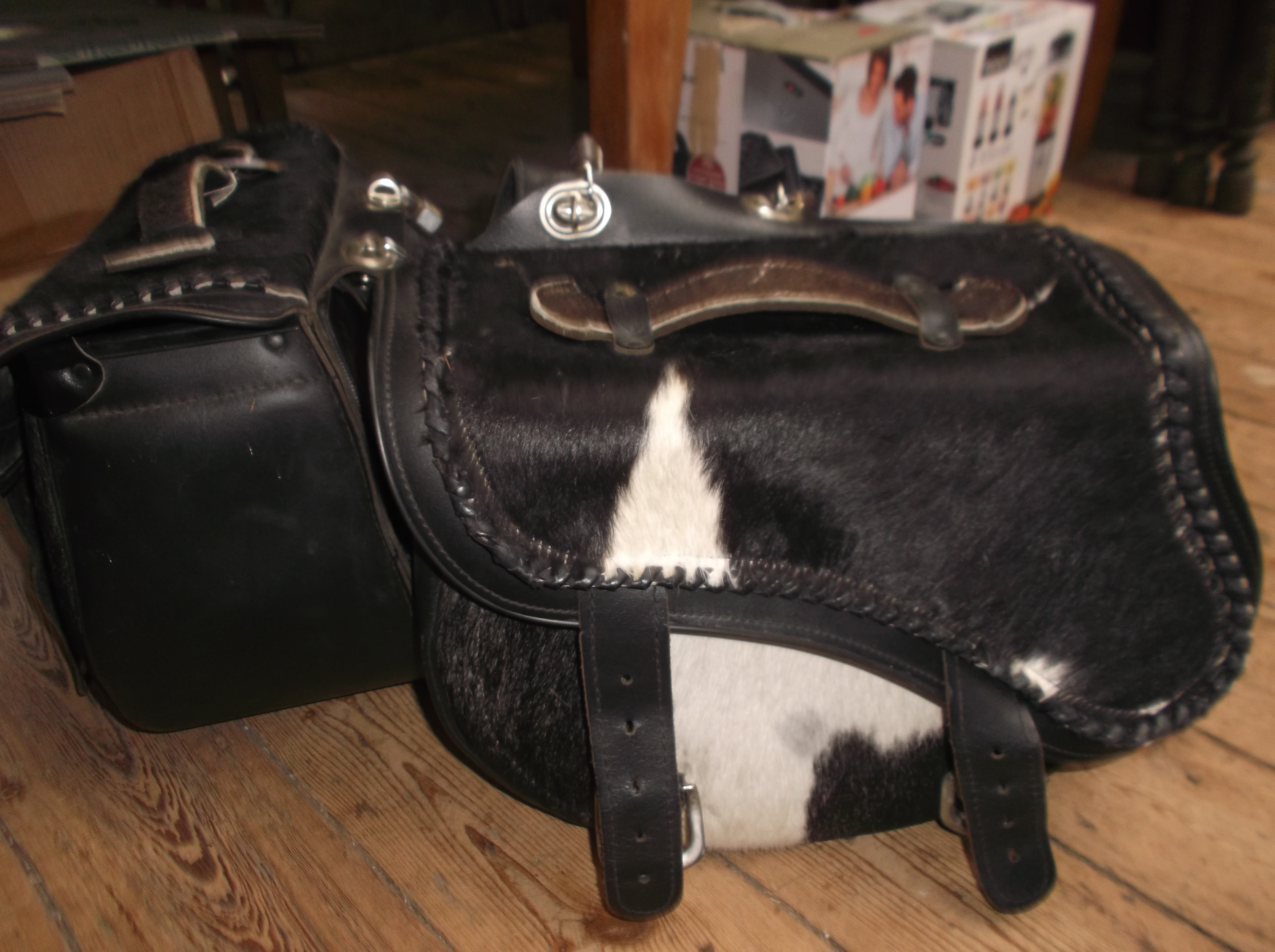 Pair of black leather horsehair effect motorbike panniers