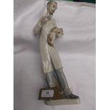 Rare Lladro figure of a veterinary surgeon with puppy and needle in hand