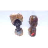 Carved figure of an African Elder and another of female with heavy headdress
