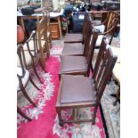 4 High backed dining chairs each with loose brown padded rexine seats