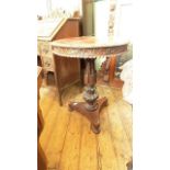 Fine circular tilt topped heavily carved rosewood occasional table on three splayed bun feet (23"