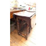 Antique oak double gateleg oval topped dining table ( 40" x 46" when fully extended)