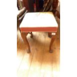 Oak framed dressing stool on shaped spud feet the padded seat in needlework finish