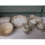 Edwardian gilt surround multi-coloured floral patterned part bone china tea service (16 pieces)