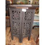Heavily carved blackwood octagonal topped Oriental table and stand