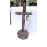 Carved crucifix with metal figure of Christ