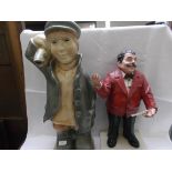 Plaster ornament of a moustached gentleman entertainer and another of a fisher boy