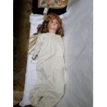 German pot head loose limbed doll, fixed eyes, blonde hair,